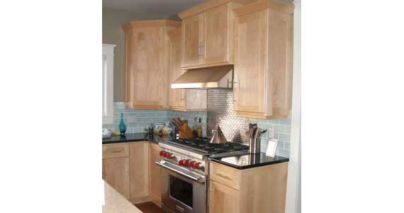 clear-coat-maple-cabinets-with-glass-tile-backs