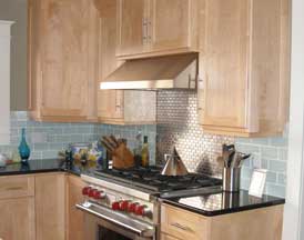 clear-coat-maple-cabinets-with-glass-tile-backs